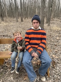 my brother (David) and my nephew (Syris) sitting on a bench at homer lake